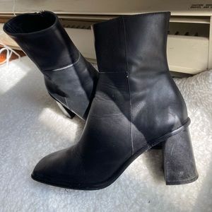 Black heeled square toe boots